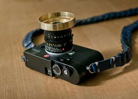 The special editon brass ventilated shade on the 35mm AA and Leica M10 with Rock'n'Roll strap on the camera. 