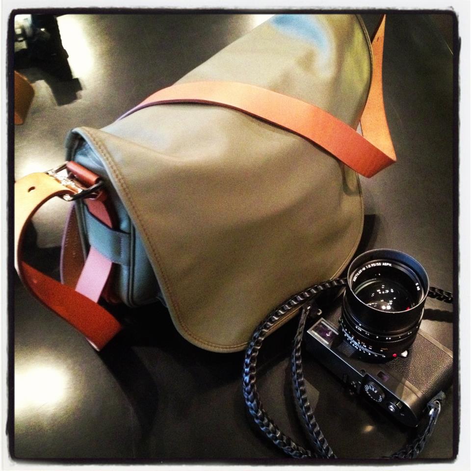 Hermés Barda camera bag and Annie Barton camera strap. The Hermés "Barda" bag comes in two sizes, 35 x 27 x 7 cm and 43 cm and in etain/pewter and ebene/ebony colors and black sikkim calfskin leather. The price is HK$49700 and HK$58600 respectively.