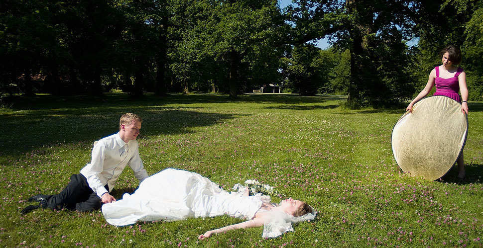 Bridesmate holding gold reflector