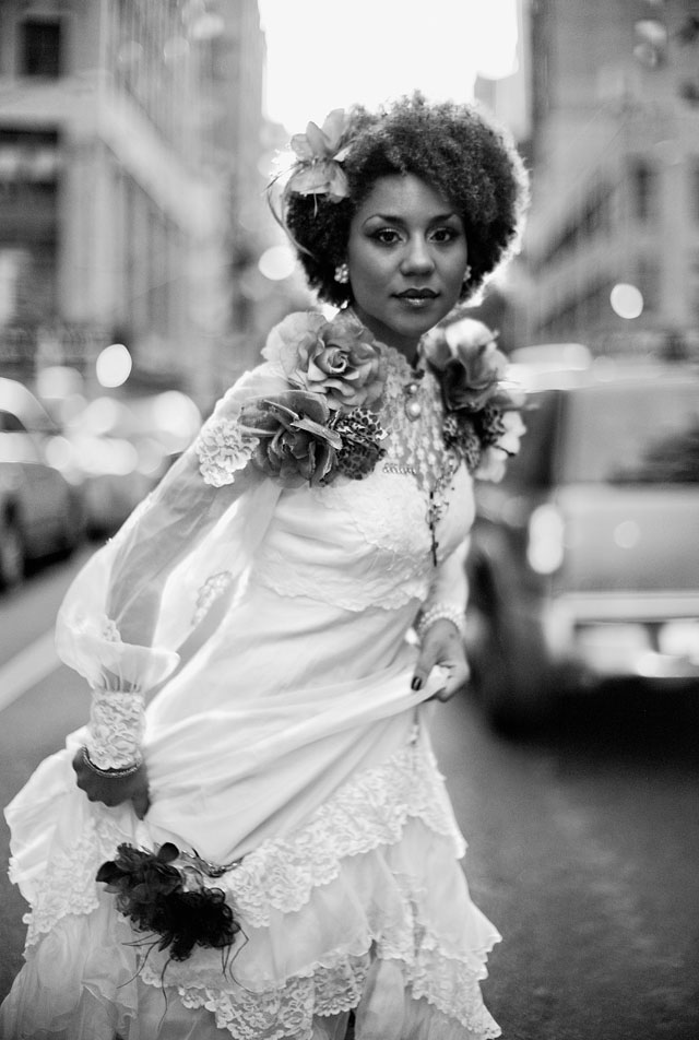 American singer and model Joy Villa, New York, August 2012. Leica M9 with Leica 50mm Noctilux-M f/1.0. External light meter to get the face and dress right despite ever-changing headlights of approaching cars and a sun setting in the horizon. 