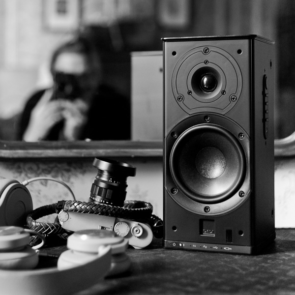 Doing a little Instagram post about my Dali Kubik Free loudspeakers that I travel with (with the Leica M10 and headphones from Fendi and B&O lying around as well). 