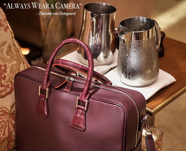 A travel bag, for cameras. Designed by Thorsten von Overgaard and Matteo Perin. Soft Italian Burgundy Red Leather with Croc Details