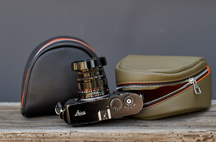 The "Always Wear A Camera" soft leather camera pouch for Leica M and Leica Q2 cameras. See more here.

