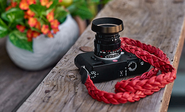 Here's another of the Leica M10 with a red Napa Strap from www.rocknrollstraps.com. Lens is the 50mm APO-Summicron LHSA-edition in black, with my own designed ventilated shade E39 (the one the LHSA-edition comes with is brass and a little bulky).