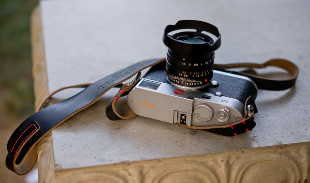The HAWKESMILL brown leather camera strap is made in England. It's a new brand started in 2016. It has a large o-ring and a protector for the camera body so it doesn't get scratched. They are also making some nice camera bags. Leica M 240 with orange engraving on top (made by Leica Camera in Wetzlar) and 35mm FLE with my own designed ventilated lens shade