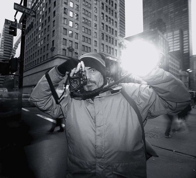 Magnum photographer Bruce Guilden with his Leica