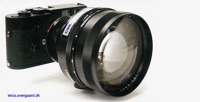 The Leitz ELCAN-M 90mm Noctilux-M f/1.0 model C164 on a Leica KE-7 film camera made for the U.S. Navy.