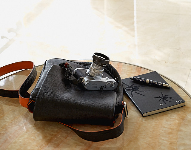 The Von Messenger Mini Bag in black calfskin.