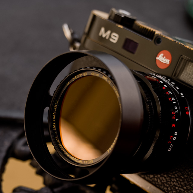 The Leica 50mm APO-Summicron-M ASPH f/2.0 LHSA Black Lacquer Limited Edition (Nov 2017) with the E39 ventilated shade by Thorsten von Overgaard, and Breakthrough Photography 3-stop neutral density "X4-ND" filter 46mm. The E39 ventilated shade has an E46 filter screw in the front). 
