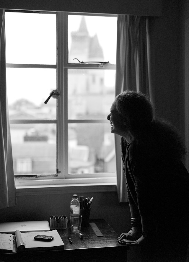 Hannah laughing. Inside the girls' dormitory at Cambridge University. Leica M Monochrom (2021) with Leica 50mm APO-Summicron-M ASPH f/2.0 (2012). 3200 ISO. © Thorsten Overgaard