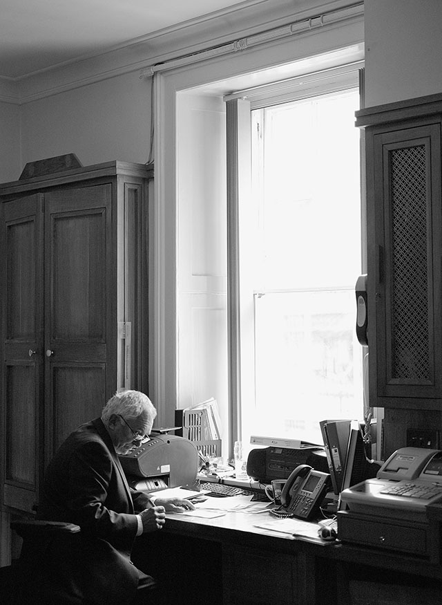 Cambridge University: It took about 60 seconds before the guard turned on the creaking chair and gave me the look. They have those looks. Leica M Monochrom with Leica 50mm APO-Summicron-M ASPH f/2.0

