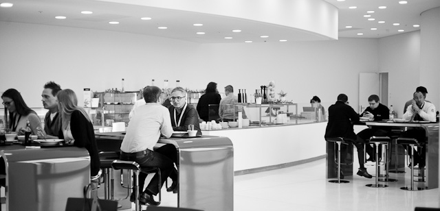 The buzzing canteen with bright wide windows to the square in front of the factory. Here everybody from inside and outside the factory meets at lunchtime and enjoy healthy fresh cooked food, coffee and each others company. Leica M 240 with Leica 50mm Summicron-M f/2.0 II