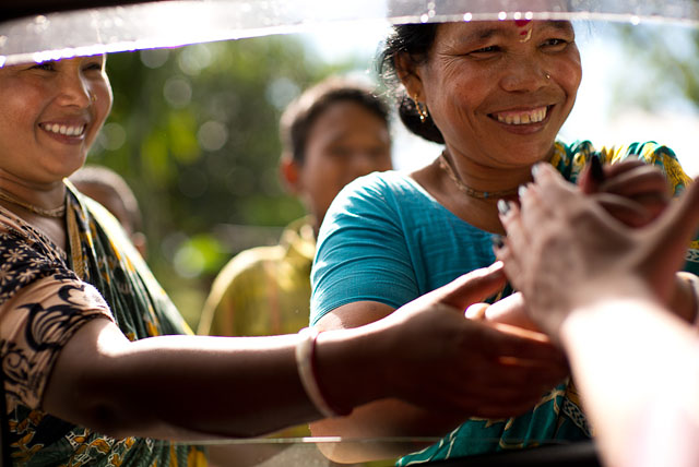 The final goodbye when we left in the car. New friends and fans forever... Dinajpur, Bangladesh. © 2014 Thorsten Overgaard. Leica M 240 with Leica 50mm Noctilux-M ASPH f/0.95. 