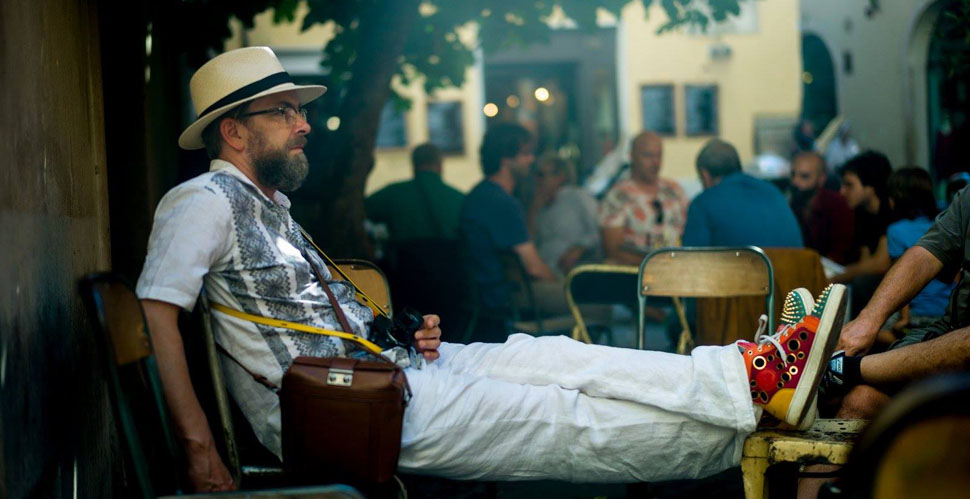 Photo by Morten Albek: "Leica photographer Thorsten von Overgaard having a short break in the shadow of a fig tree in Rome, during the recent Leica photo workshop. : Leica M9 with Leica 50mm Summilux-M ASPH f/1.4.  