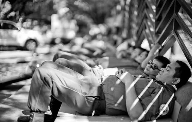 Security officers traking a rest in the shadow. This week was the OPEC meeting with Obama and many other in town. Leica M 240 with Leica 50mm Noctilux-M ASPH f/0.95. © 2015-2016 Thorsten Overgaard.