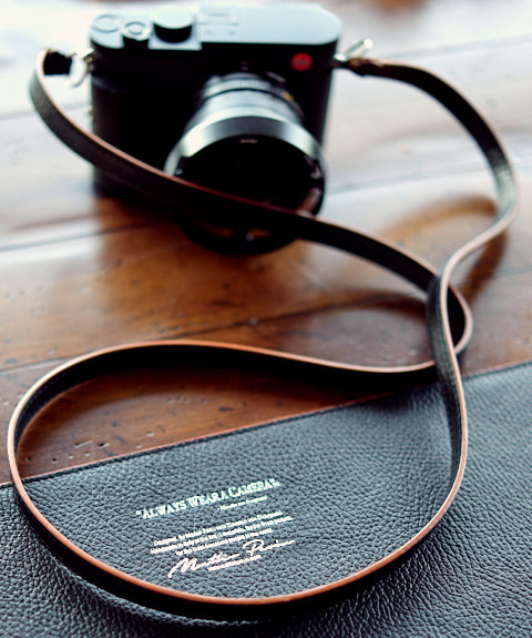 The Black Calfskin Orange Edge Camera Strap on the Leica Q2.
