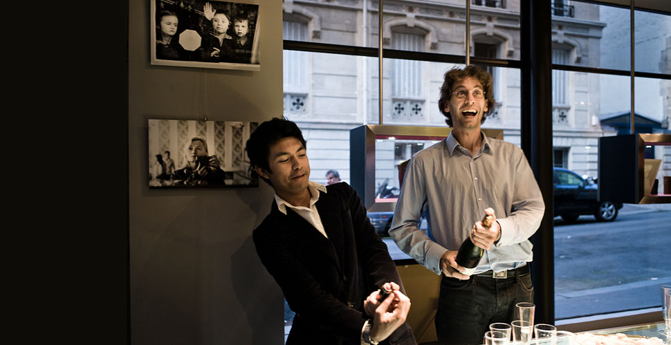 Bruno and Anthony of the Leica Store Paris open champagne for the guests. Photo by Birgit Krippner
