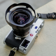 Ventilated shade in black paint for the Leica 21mm Summilux-M ASPH f/1.4. 