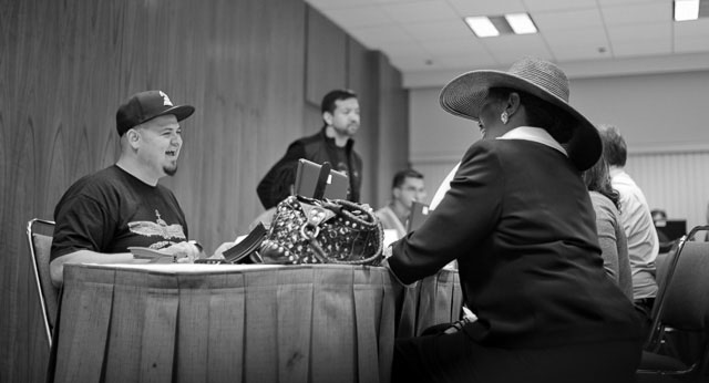 Inside the Grammys. Every year all guests attending the Grammys have to pick up their tickets at this office at The Staples Centre, and almost without exception they ask for extra things like drive-on access, red carpet access and all the other very limited treats. Leica M 240 with Leica 35mm Summilux-M ASPHERICAL F/1.4 AA. © Thorsten Overgaard.