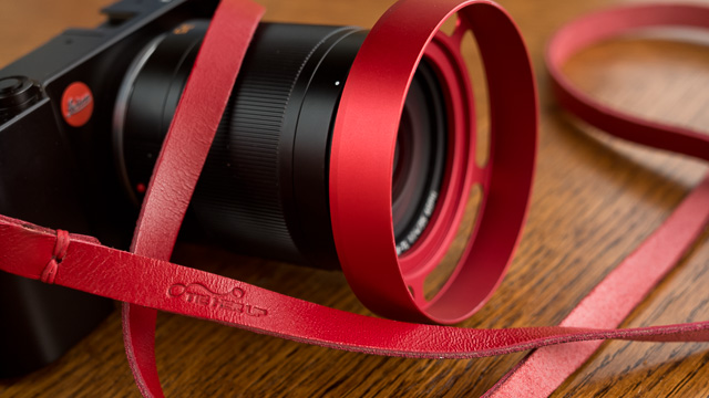 I got some new straps from Tie her Up. Here it's the Leica TL2 that got a red strap and a RED ventilated shade E60. © Thorsten Overgaard.
