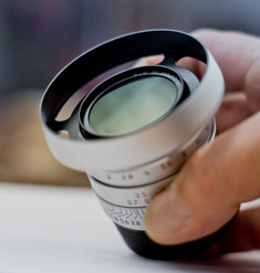 The silver ventilated shade on a 35/2 ASPH with step-down ring and 39mm ND filter mounted.