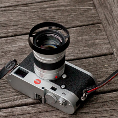 My black ventilated shade also fits the 90mm Summarit-M f/2.4 (a model #9024OUS sits on outside screw)