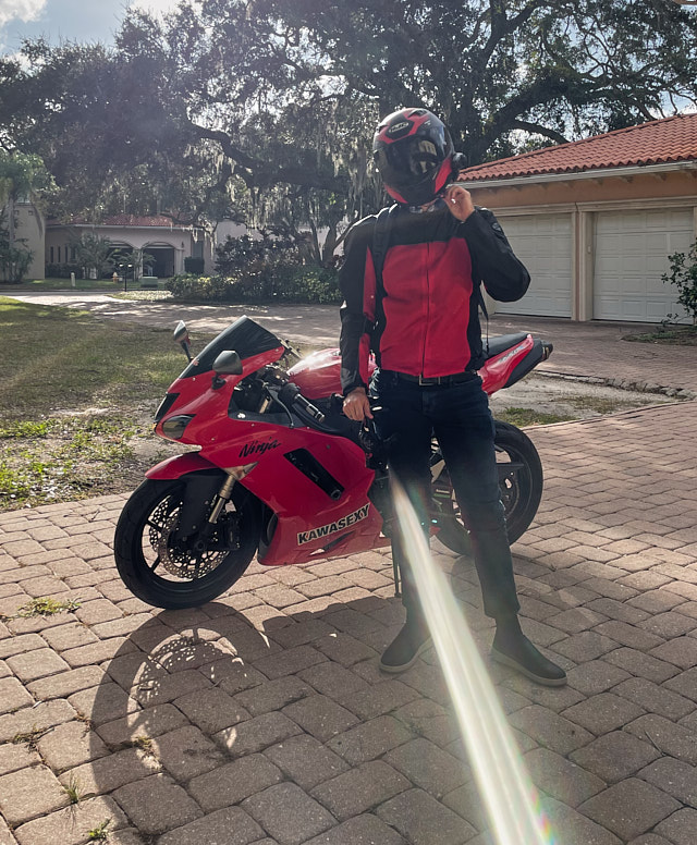 My son Oliver with the bike. 