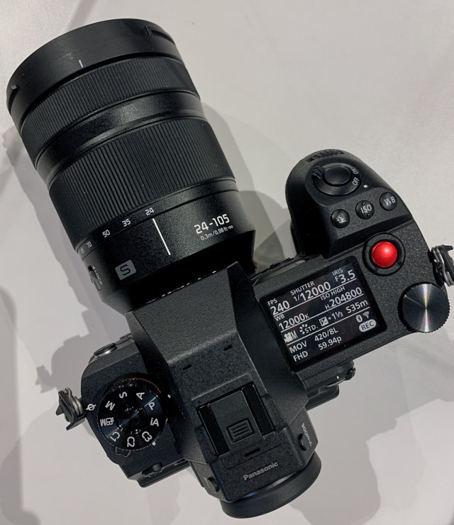 Panasonic Lumix S1H is going to be quite a video camera, not based on the same body as the Lumix S1 and Lumix S1R, but an entirely redesigned 6K and 4K video body with ventilator and all ... that takes L-mount lenses and can also take still photos. Look at the nice red release button. 