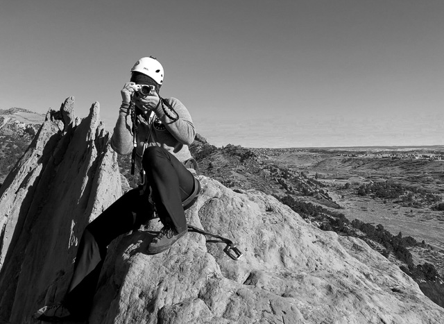 Natasha Smith. with the Leica M10 on the top of the rock