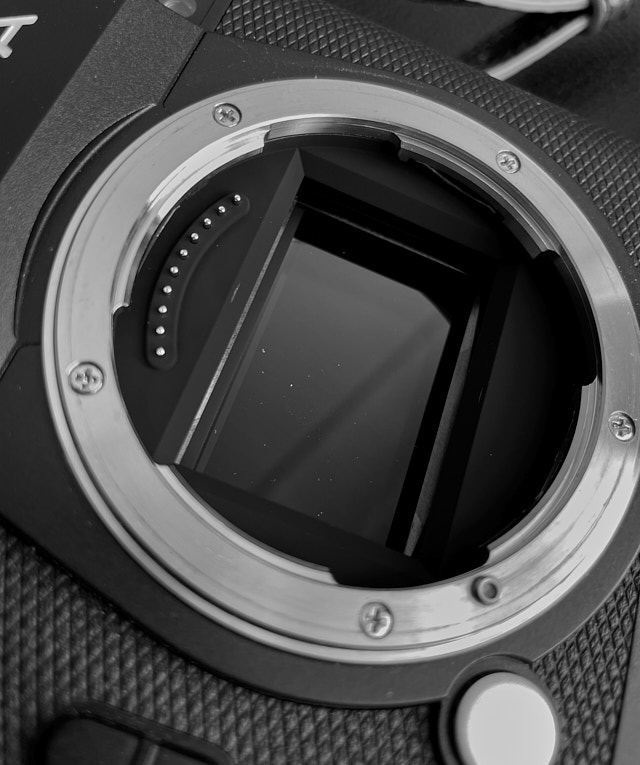 Some serious sensor dust on the Leica SL sensor. Not enough to be visible on the photo when using a lens at f/0.95 or f/1.4 or even f/2.0. But it is easy to clean you sensor with a swab and liquid. The Leica SL also features untrasonic cleaning when the camera is turned on, which takes some of the dust. © Thorsten Overgaard.