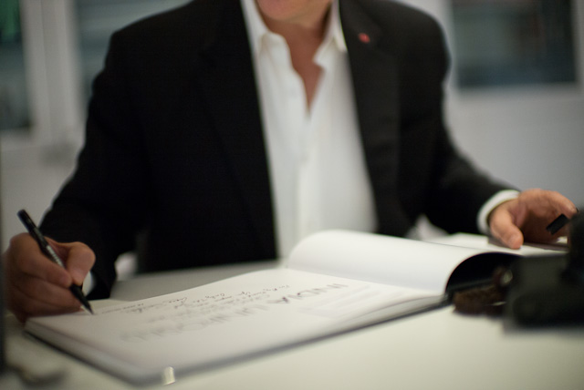 Robin photographed Craig when he signed them.