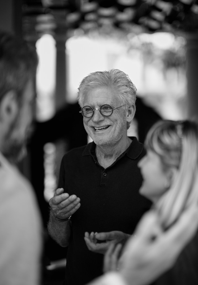 Portrait with 'extreme depth of field' by pushing background back and foreground people closer to the camera. As they say on the mirrors on cars, 'Objects in mirror are closer than they appear'. © Thorsten Overgaard.