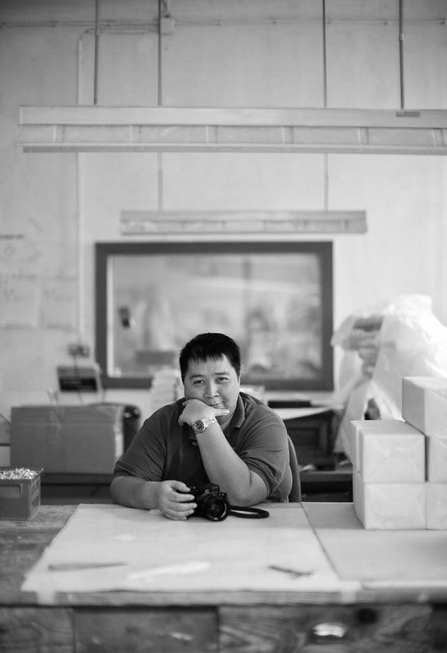 Sony Hassan from Jakarta in Vienna, patiently waiting to shoot the model inside a boxmaking factory.   