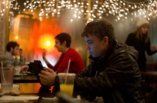 Another picture made up of interesting light conditions, my son Oliver with his new iPad inside the Atlas Kafe in Williamsburg.