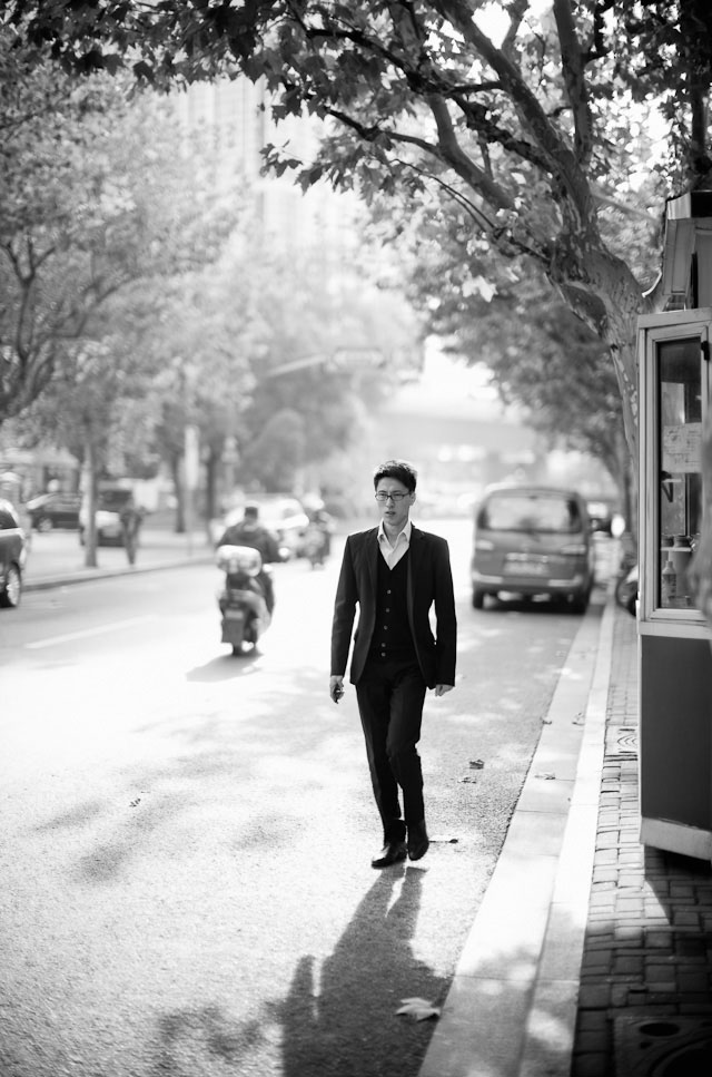 "Jaywalking in the People's Republic" gives an idea how a wide open lightstrong Leica lens treats highlight and shadow. With Leica M 240 and Leica 50mm Noctilux-M ASPH f/0.95 and B+W Neutral Density filter. © 2014 Thorsten Overgaard. 