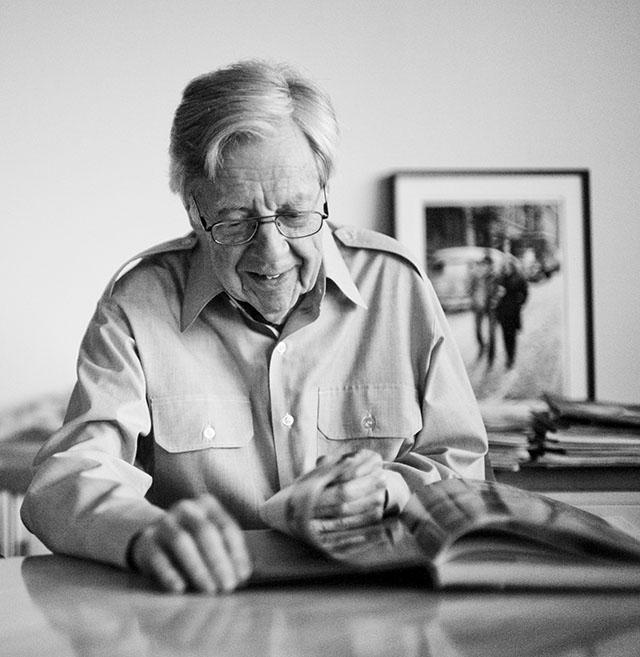 Don Hunstein in his apartment by Central Park in New York, with his book Keeping Time on the table and one of the Bob Dylan Freewhelin' images in the background. Leica M 240 with Leica 50mm Noctilux-M ASPH f/0.95.   