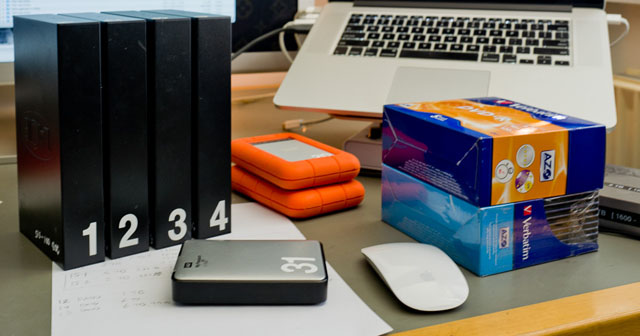 External hard drives is the most low-tech and simple way to back up yor computer and archives.