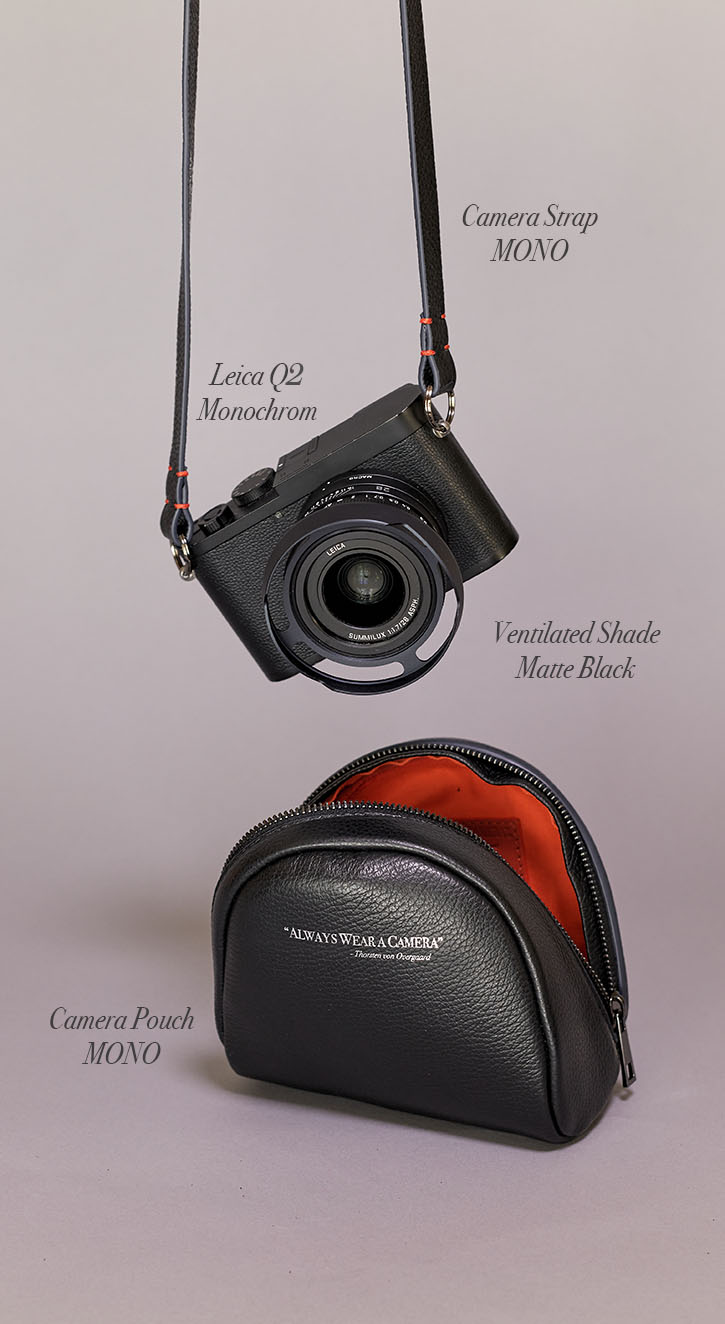 The Von Camera Pouch in MONO with gun metal zipper, and Leica Q2 Monochrom with Yosemite MONO strap and ventilated shade in matte black.