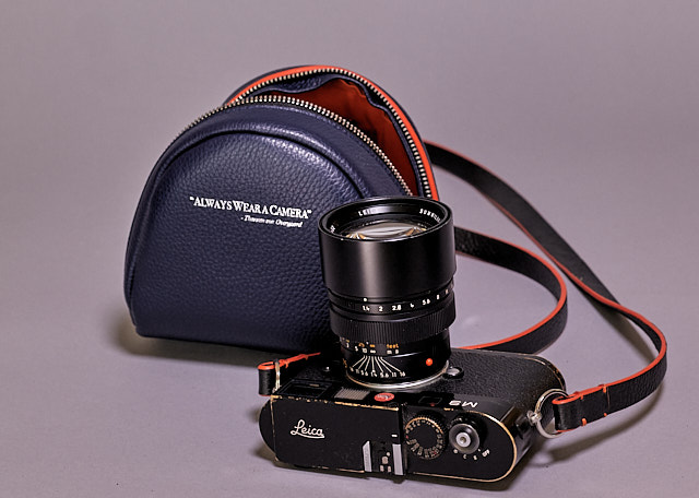 Leica M9 with Leica 75mm Summilux-M f/1.4 and the "Always Wear A Camera" camea pouch in Berlin Blue calfskin. Camera strap is the Yosemite black calfskin. 