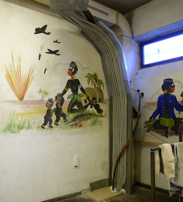 From one of my local news stories I visited the basement under our city hall. During World War II this basement was the office of the Air Observatory that would rign the alarm for incoming bombers. As a mix of artistic inspiration and boredom, they spent their irdle hours painting the walls. Leica Digilux 2. © 2007-2016 Thorsten Overgaard.