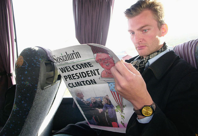 Danish writer and editor Oliver Stilling reading the newspaper in the press bus in the Faroe Islands during Bill Clinton's visit which we covered together for a major Danish magazine. (See my story "Photographing President Clinton"). Oliver coincidentally today runs a very innovative newspaper, Foljeton.dk in Denmark - a storytelling subscription-news-page that is made to be read on the smartphone, cutting things down to the essential by focusing on few issues, and then write relatively lengthy, extremely competent and well-written stories on those select subjects. "Big stories for small screens", it started just one year ago. Subscription is $8 a month and the project is based on subscribers, not advertising. Leiac Digilux 2. © 2007-2016 Thorsten Overgaard.