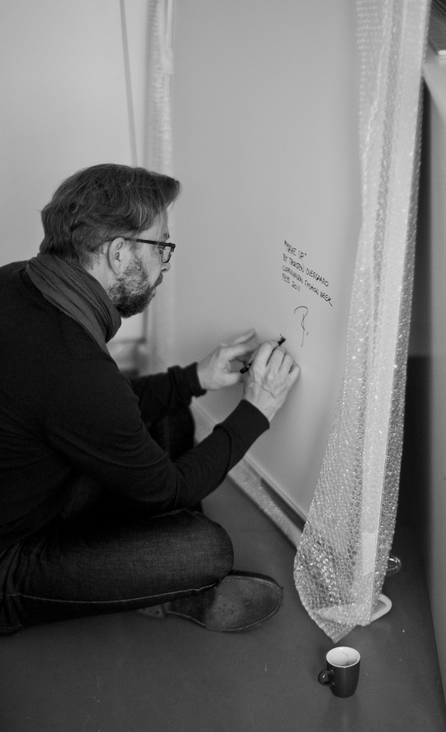 Thorsten Overgaard signing prints in Leiac Galerie Salzburg. Leica M9 with Leica 50mm Noctilux f/1.0. ©Lisa Kutzelnig. 