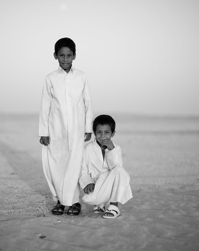 Two brothers in the Qatar desert. Leica M Monochrom with Leica 50mm Noctilux-M ASPH f/0.95. Thorsten Overgaard. 