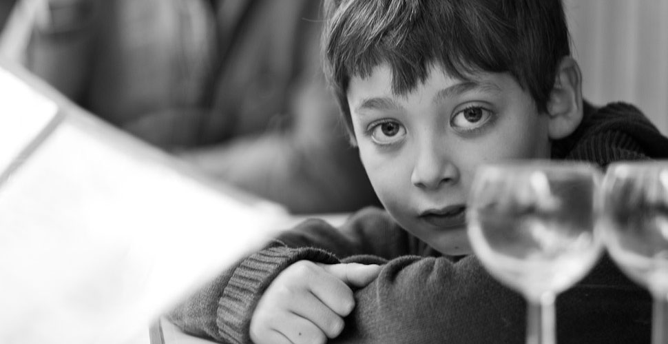 Boy in restaurant, Paris. Leica M Monochrom with Leica 50mm Summicron-M f/2.0 (II).  © 2013-2016 Thorsten Overgaard.