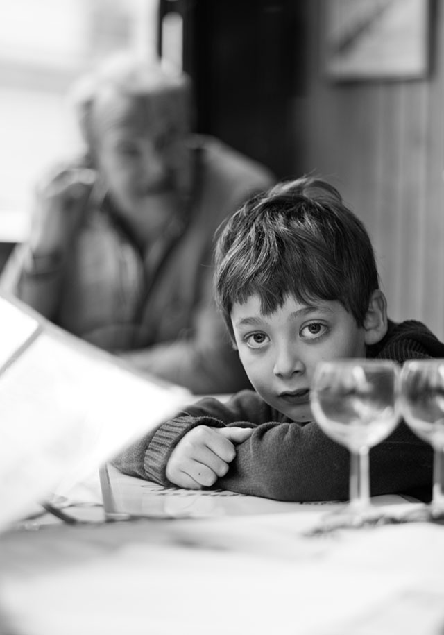 "Boy in Paris Restaurant" signed print by Thorsten von Overgaard
