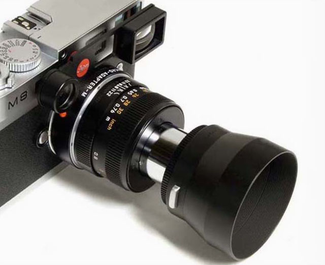 The precious macro set with googles and angle-finder as it used to be for Leica M9 and previous models of the Leica M without Live View. Leica 90mm Macro-Elmar-M f/4.0, Angle viewfinder M (not seen in this photo) and Macro Adapter M. Photo by Harry's Pro Shop.