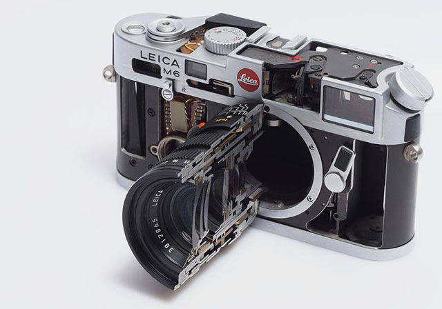 Leica M6 Classic cut-through camera. Here with the Tri-Emar, which is a marvel to study becuase it is three-in-one lens where the modules change inside as you change it from one to another. 