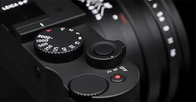 Dark it is, and matted. The shutter release button is now the same model as on the Leica M10-P and the Leica CL. The red diot button is (unchanged and is) the video button. The Leica Q does video in a little less than 4K.
