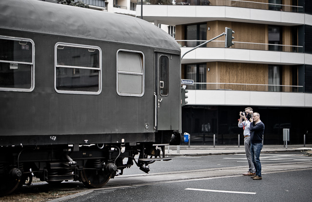Some times you get lucky and a train comes by in the street. © Thorsten Overgaard. 