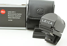 The Leica Visoflex EVF2 is an $300.00 accessory for the Leica M240 and Leica M246 Monochrom that enables you to zoom in to focus, as well as seeing a live view of what the sensor records. Leica product no 18753 and it is called "Leica Visoflex EVF2".